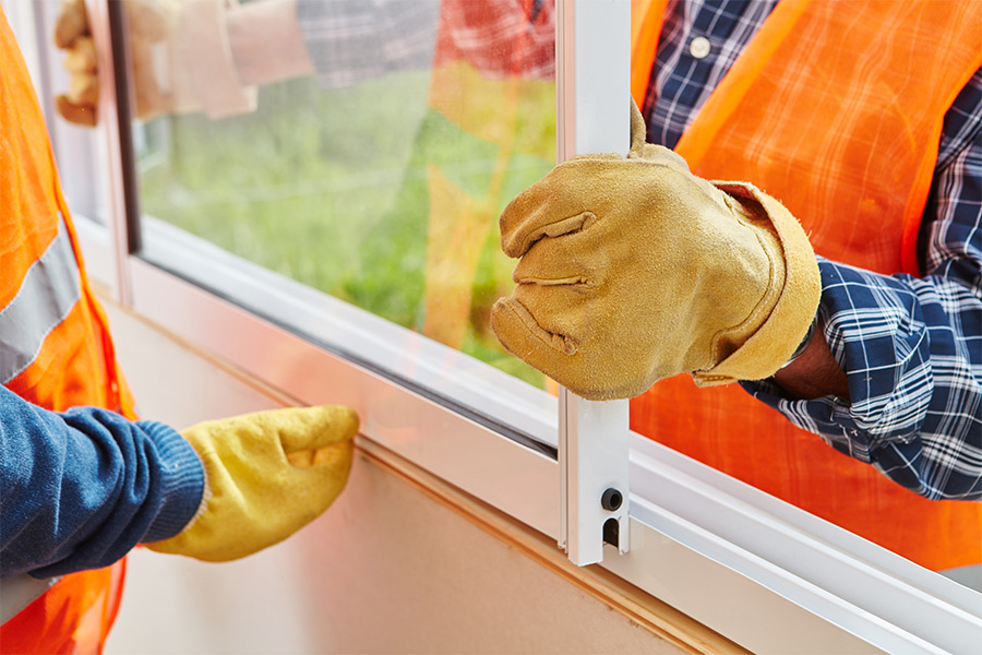 contractors-replacing-sliding-window-at-living-room-about-us